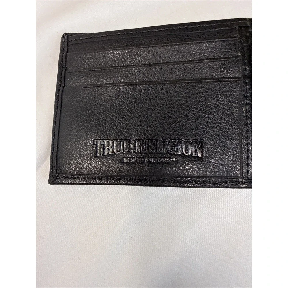 True Religion Men's Genuine Leather Black Bifold Wallet RFID Metal Logo.